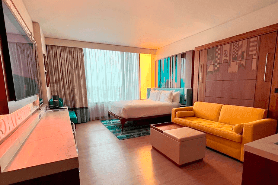 The inside of a deluxe studio at VDH. Couch and bed shown