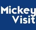 Mickey Visit logo in white text on blue background